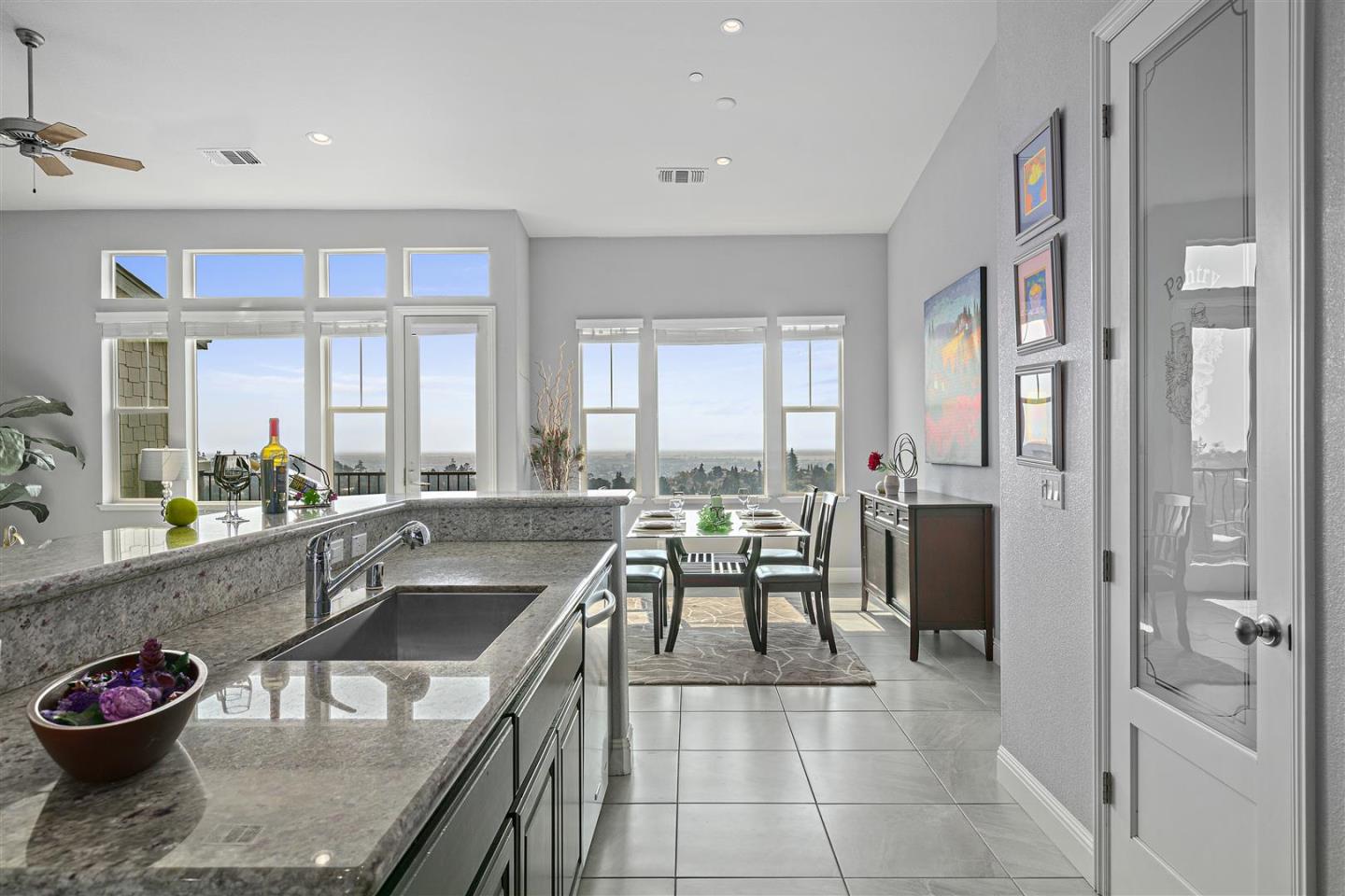 Oakland, 94605 - Photo 11 of 61 a kitchen with a table chairs and a refrigerator