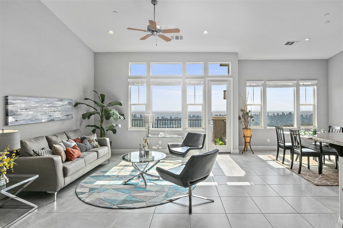 Oakland, 94605 - Photo 19 of 61 a living room with furniture windows and a dining table