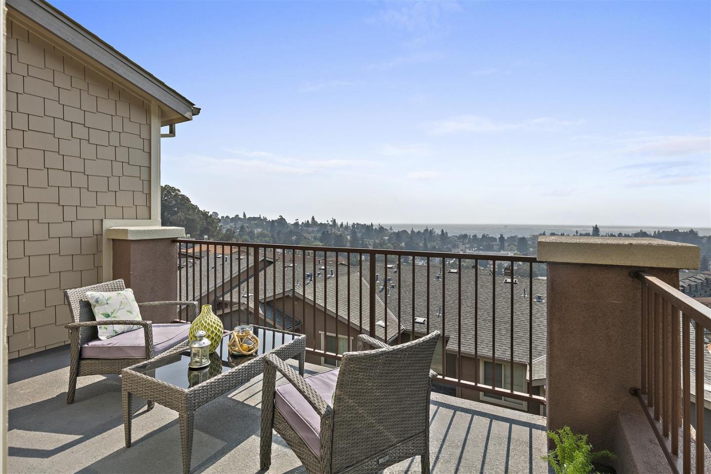 Oakland, 94605 - Photo 24 of 61 a view of a chair and table on the roof deck