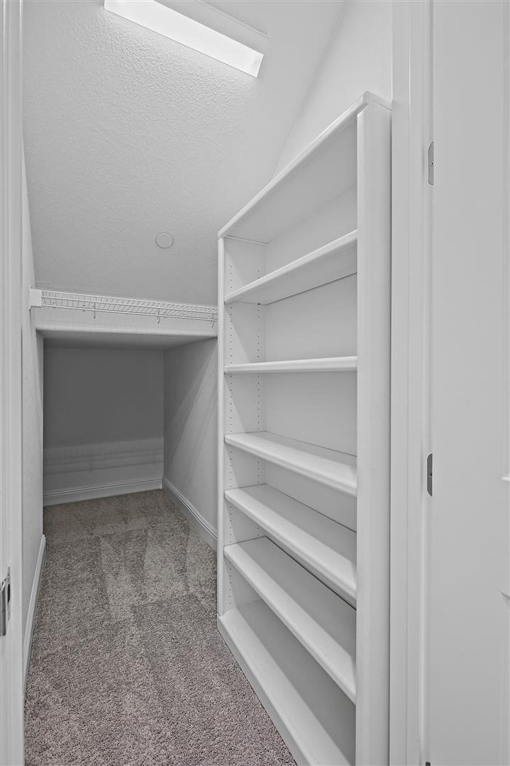 Oakland, 94605 - Photo 33 of 61 a view of an empty walk in closet