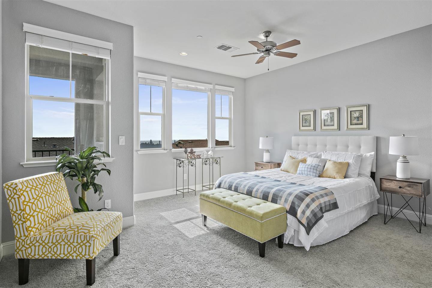 Oakland, 94605 - Photo 34 of 61 a spacious bedroom with a bed and a couch