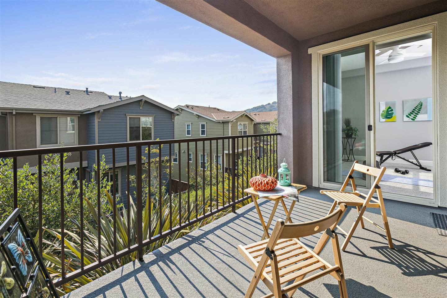Oakland, 94605 - Photo 58 of 61 a balcony with chairs and wooden floor