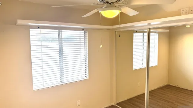 a bathroom with a bathtub shower sink and toilet