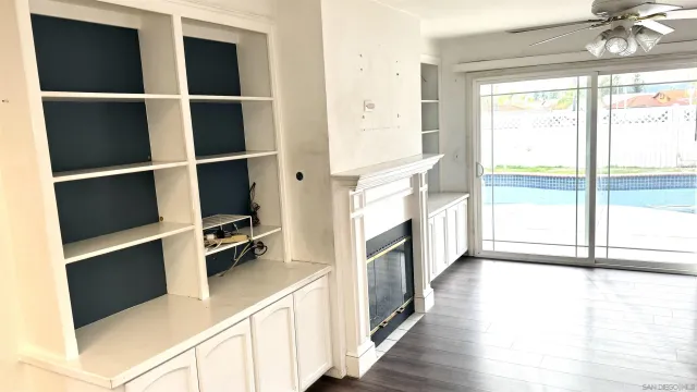 a view of a living room with furniture
