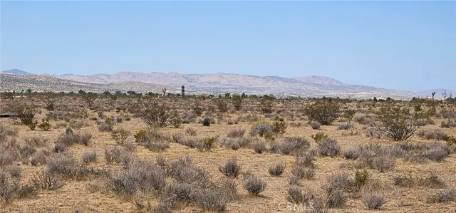 a view of a city with mountain