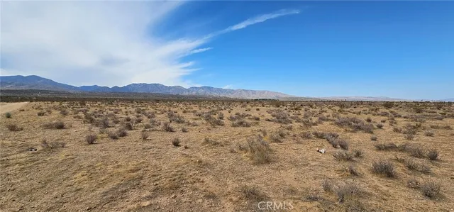 a view of an outdoor space and a mountain view