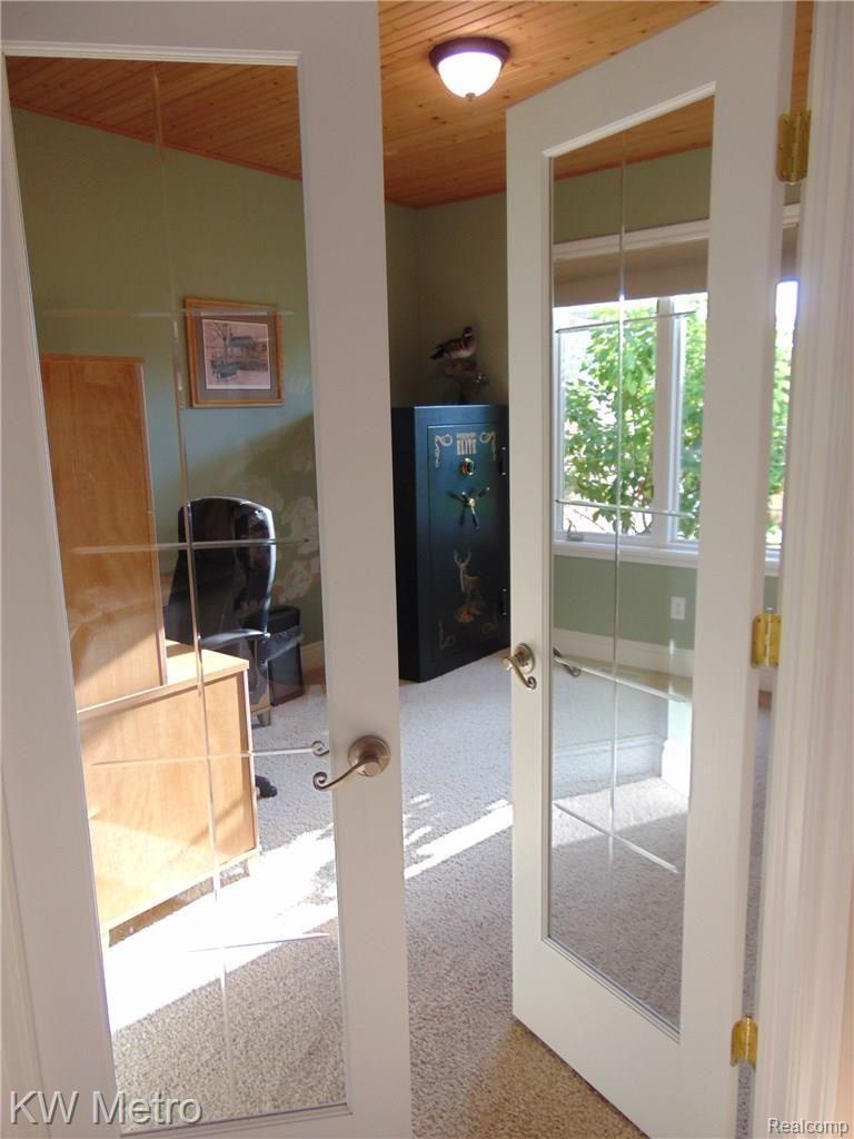 8043 Starville Road Algonac, MI 48001 - Photo 17 of 36 french doors to den, knotty pine ceiling