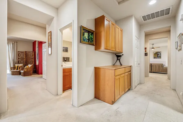 a living room with lots of books