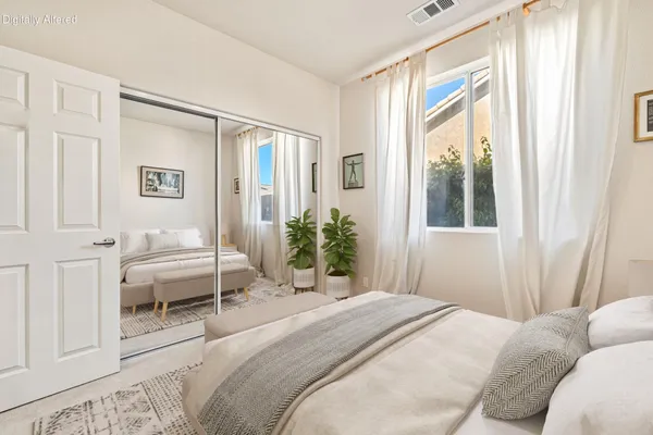a work room with furniture and a window