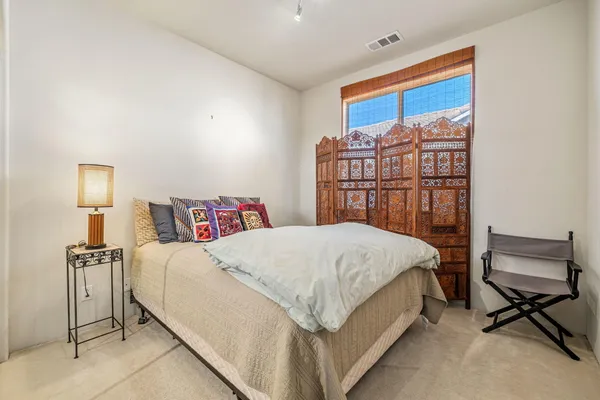 a kitchen with stainless steel appliances granite countertop a stove and a microwave
