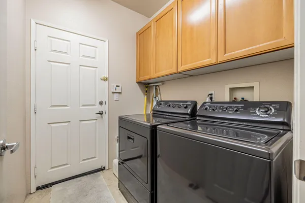 a view of a swimming pool with an outdoor seating