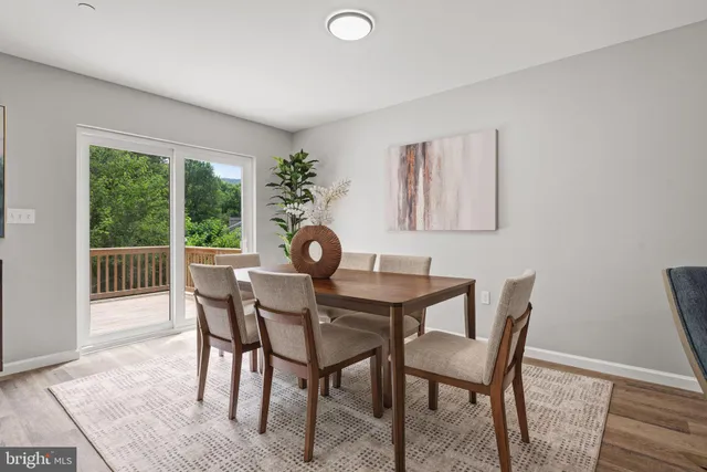 a kitchen with cabinets and stainless steel appliances