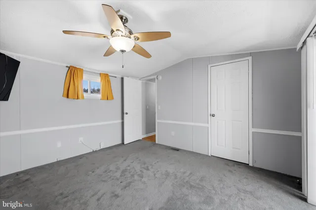 a view of an empty room with window