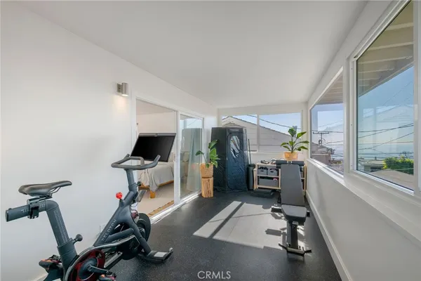a room with furniture and a window