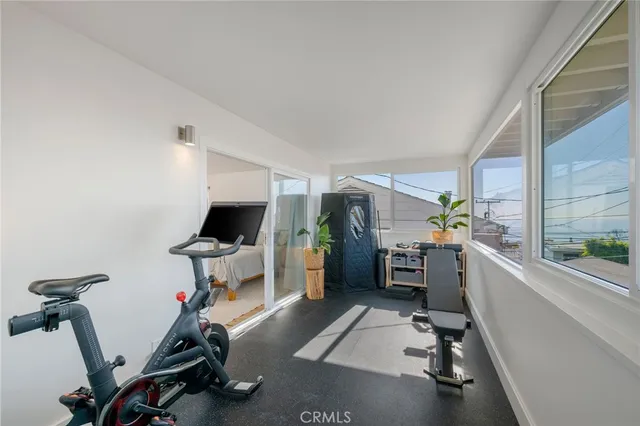 a room with furniture and a window