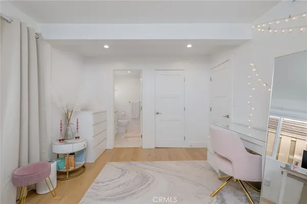 a spacious bathroom with a tub shower and sink