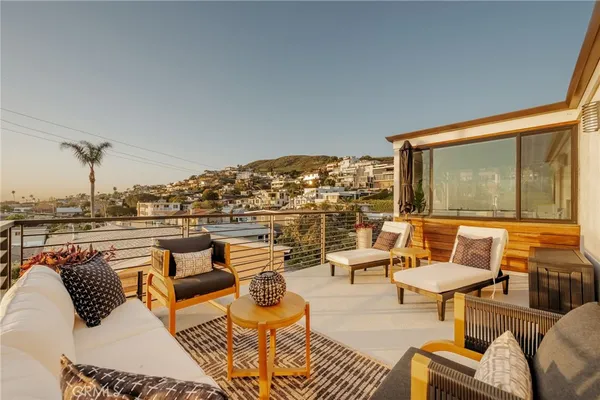 a outdoor living space with furniture and a potted plant