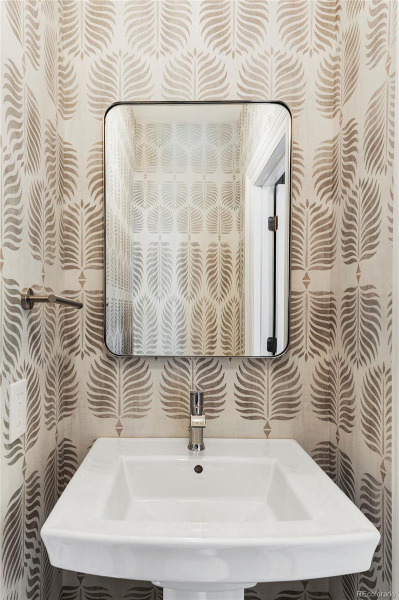 1275 Franklin Street Denver, CO 80218 - Photo 16 of 48 a bathroom with a sink and a shower