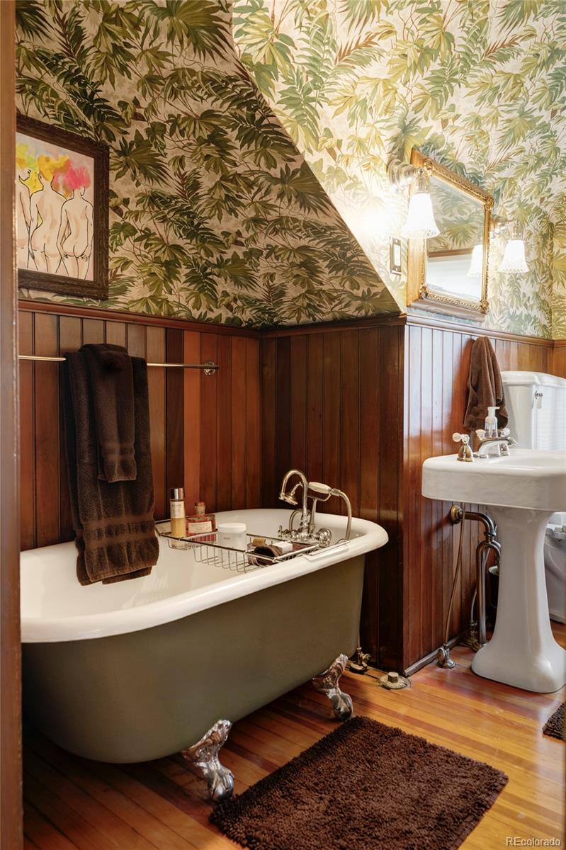 1275 Franklin Street Denver, CO 80218 - Photo 30 of 48 a room with table and chairs