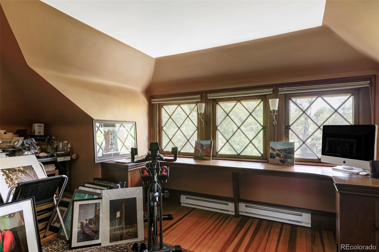 1275 Franklin Street Denver, CO 80218 - Photo 31 of 48 a view of a workspace with furniture and a window