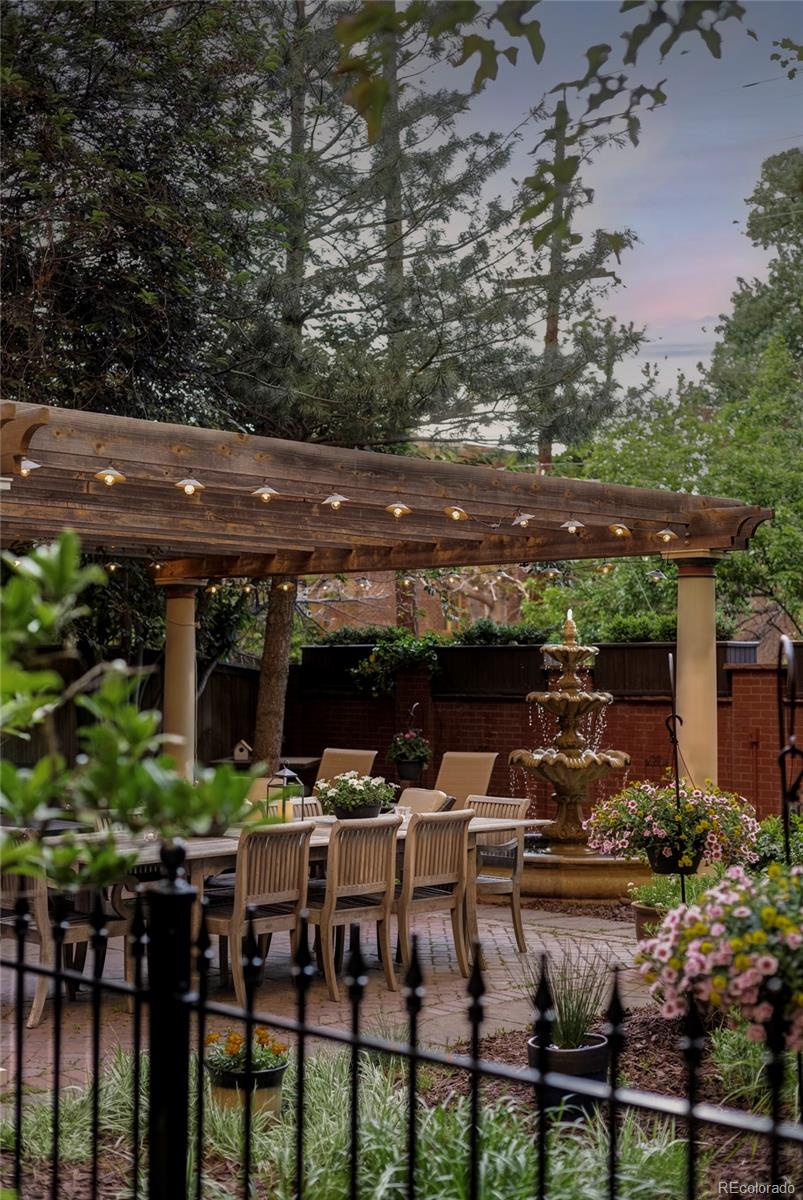 1275 Franklin Street Denver, CO 80218 - Photo 38 of 48 a view of a chairs and table in a backyard