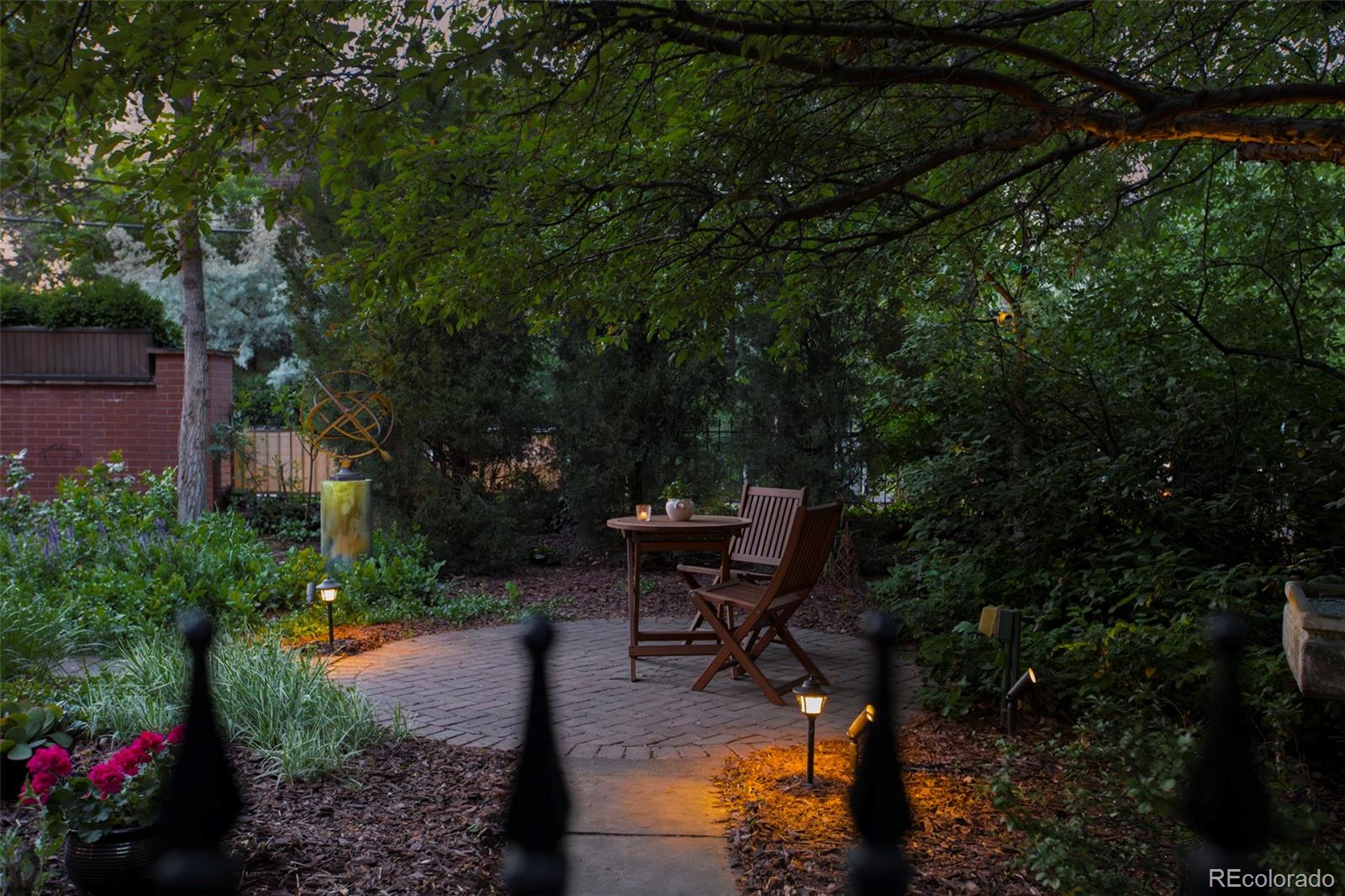 1275 Franklin Street Denver, CO 80218 - Photo 41 of 48 a view of a bench in the garden
