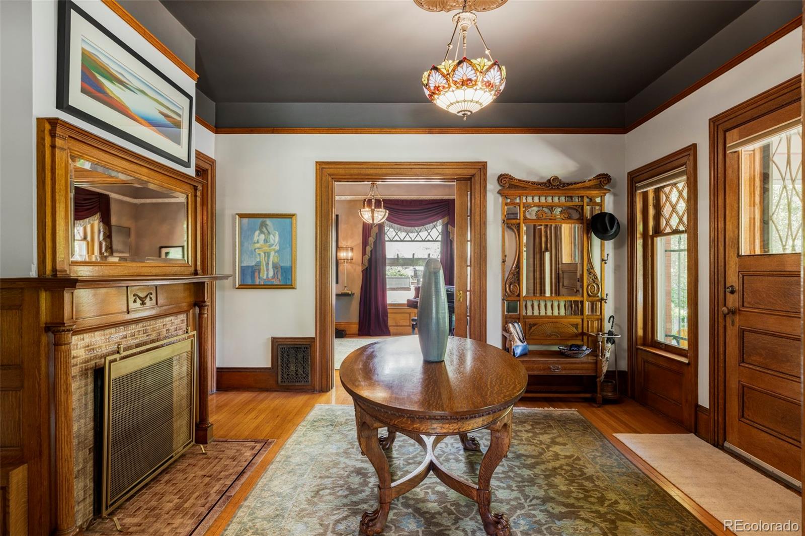 1275 Franklin Street Denver, CO 80218 - Photo 5 of 48 a view of a livingroom with furniture window and wooden floor