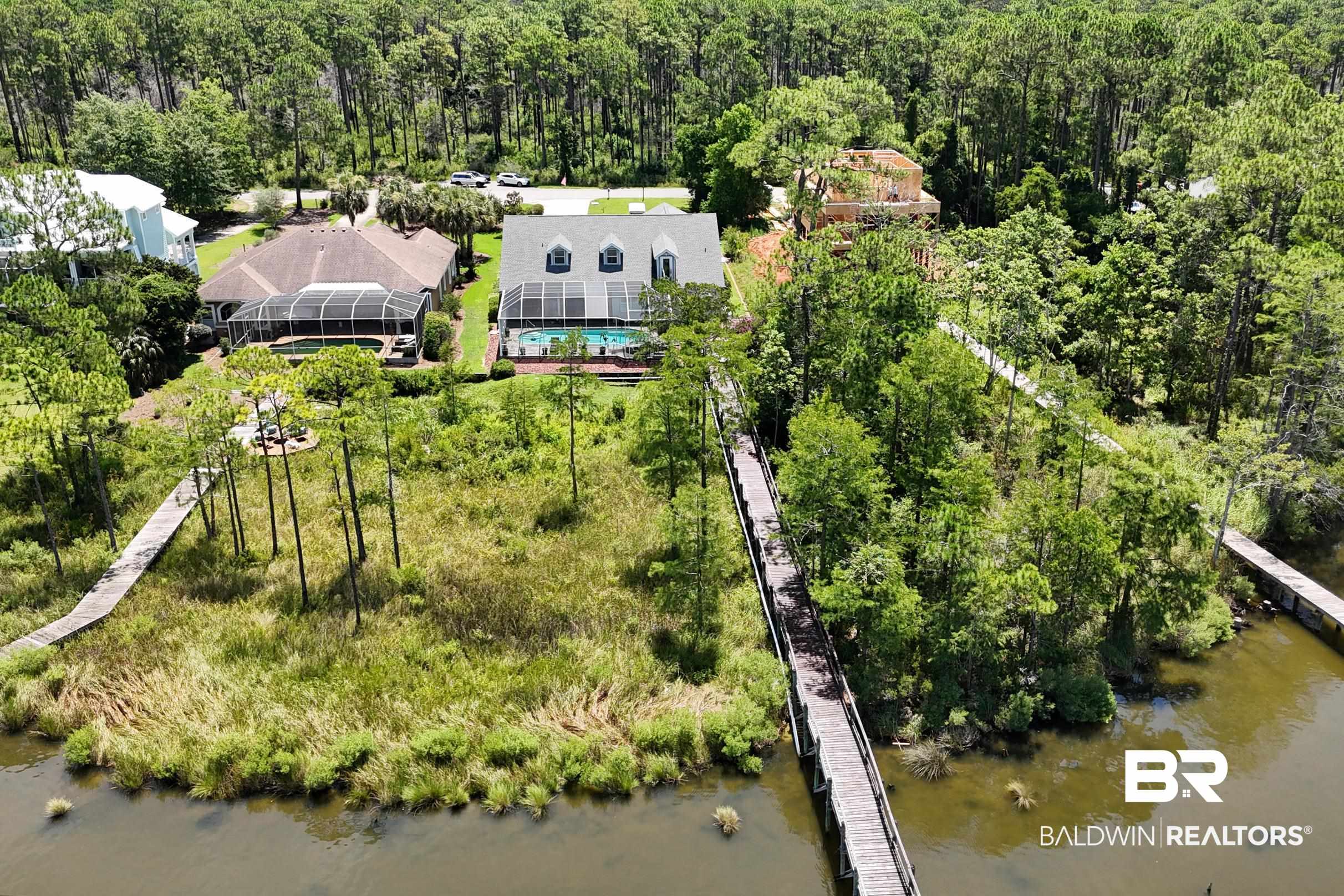 8585 Bay Harbor Road Elberta, AL 36530 - Photo 38 of 51 Drone / aerial view of a large body of water