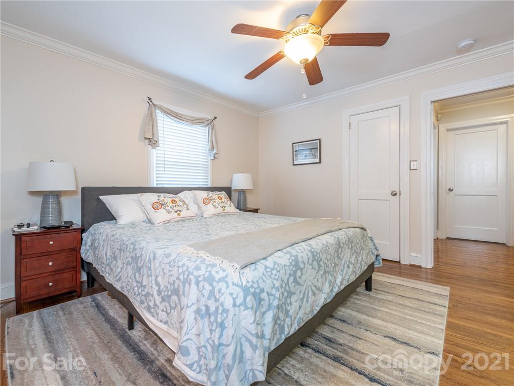 2012 Club Road Charlotte, NC 28205 - Photo 17 of 41 a bedroom with bed and wooden floor