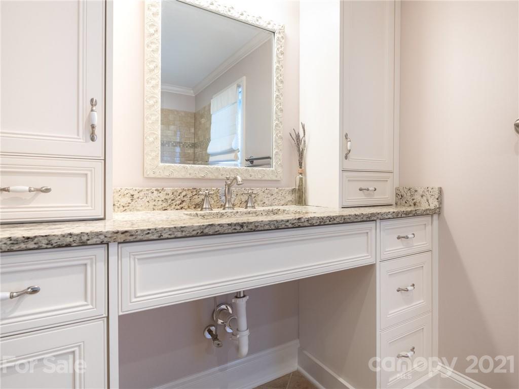 2012 Club Road Charlotte, NC 28205 - Photo 23 of 41 a bathroom with a sink and a mirror