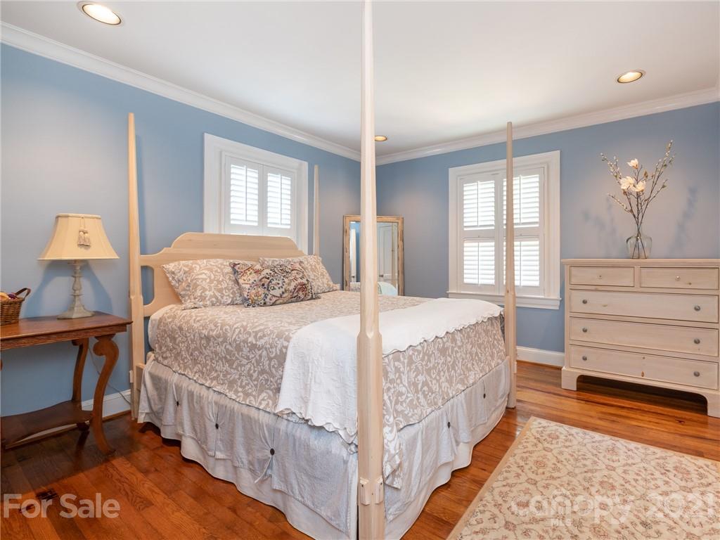 2012 Club Road Charlotte, NC 28205 - Photo 26 of 41 a bedroom with a bed and a dresser