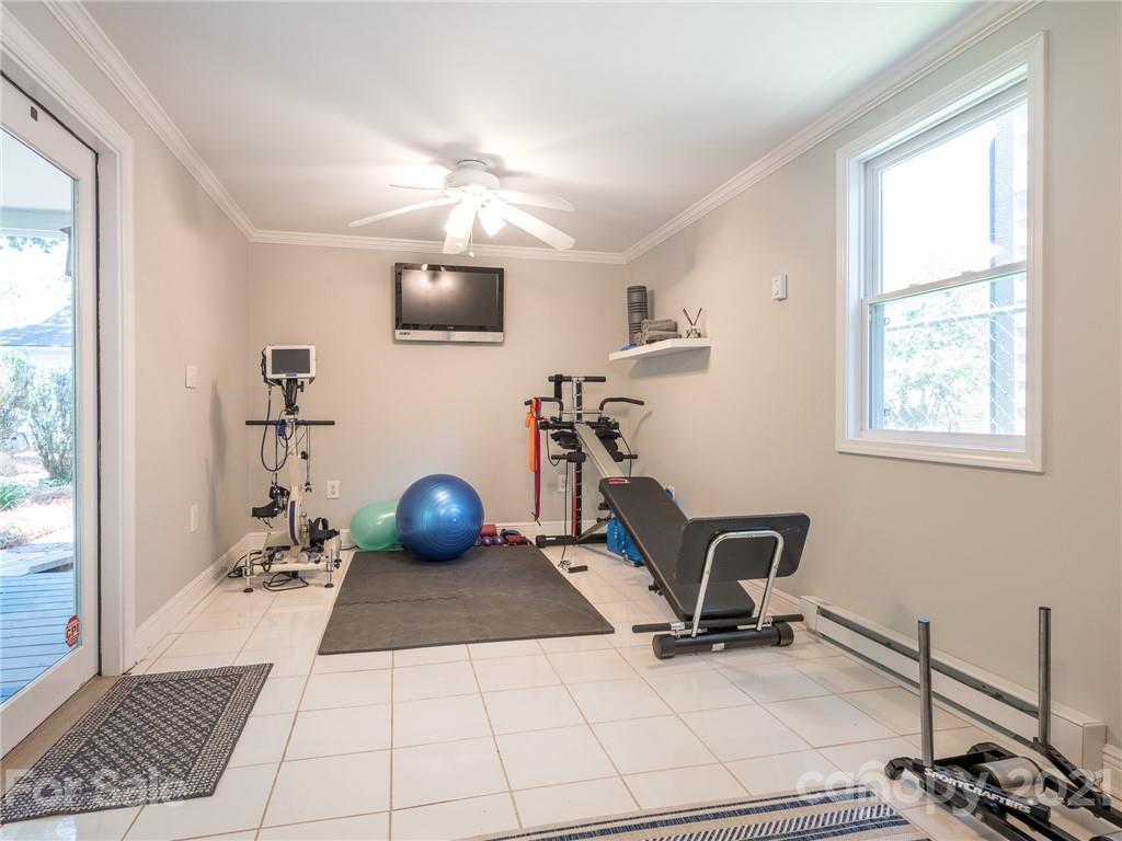 2012 Club Road Charlotte, NC 28205 - Photo 28 of 41 a view of a workspace with furniture and a window
