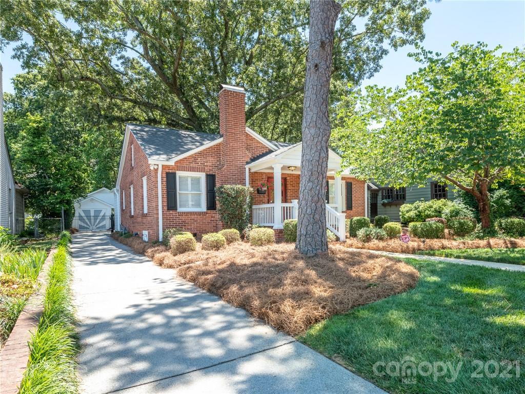 2012 Club Road Charlotte, NC 28205 - Photo 4 of 41 a front view of a house with a yard
