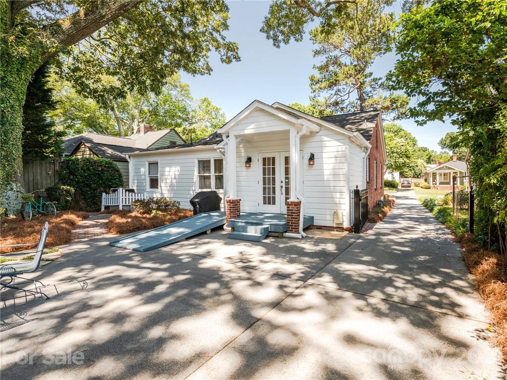 2012 Club Road Charlotte, NC 28205 - Photo 33 of 41 a view of a yard with a house and a tree