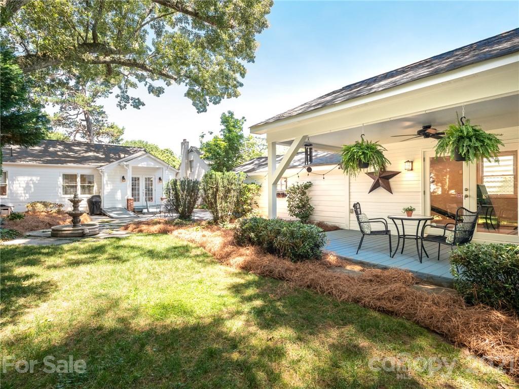 2012 Club Road Charlotte, NC 28205 - Photo 34 of 41 a view of swimming pool with outdoor seating and a patio