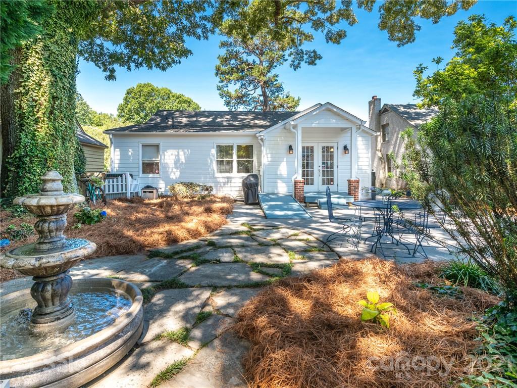 2012 Club Road Charlotte, NC 28205 - Photo 35 of 41 a front view of a house with garden
