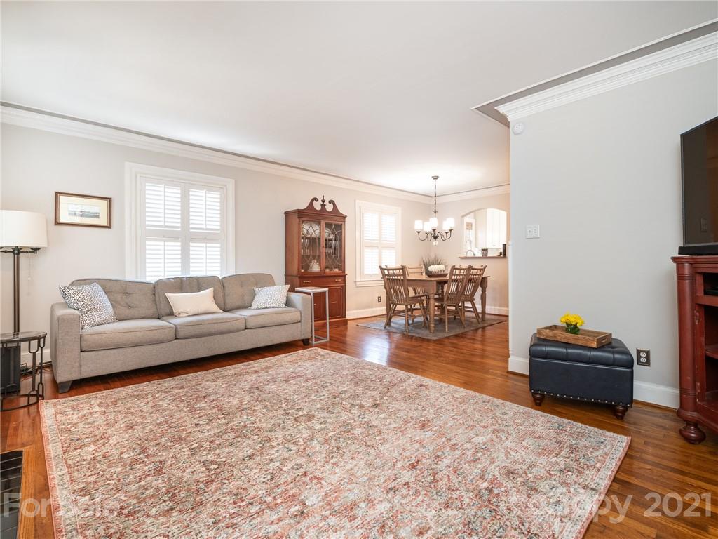 2012 Club Road Charlotte, NC 28205 - Photo 7 of 41 a living room with furniture and a flat screen tv