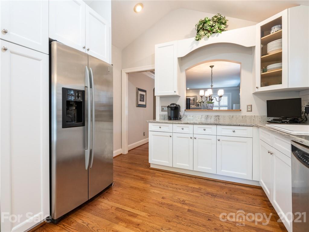 2012 Club Road Charlotte, NC 28205 - Photo 10 of 41 a large kitchen with a refrigerator and a sink