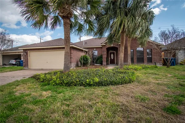 front view of house with a yard