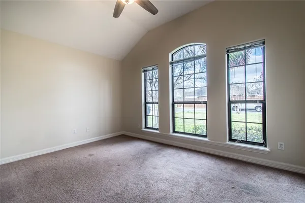 an empty room with windows
