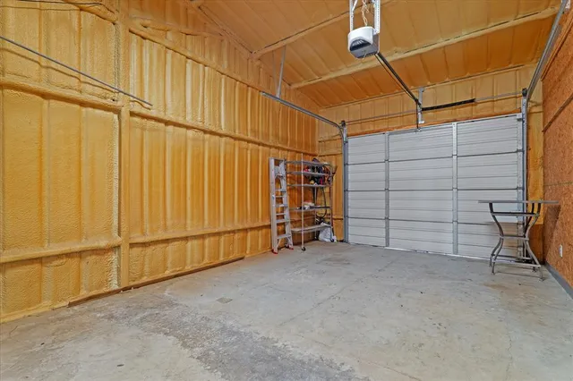a view of a garage room with stairs