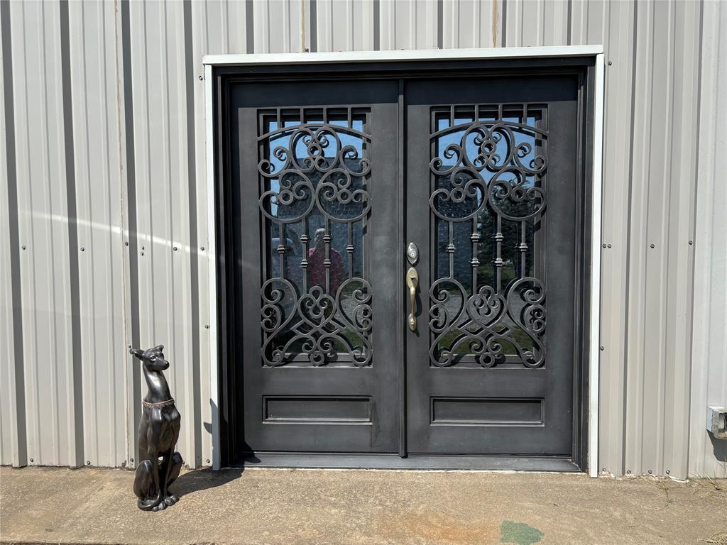 3300 Airport Road Tioga, TX 76271 - Photo 18 of 37 a view of a entryway door of the house