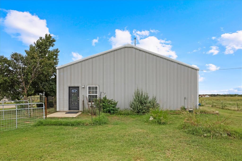 3300 Airport Road Tioga, TX 76271 - Photo 19 of 37 a house view with a garden space