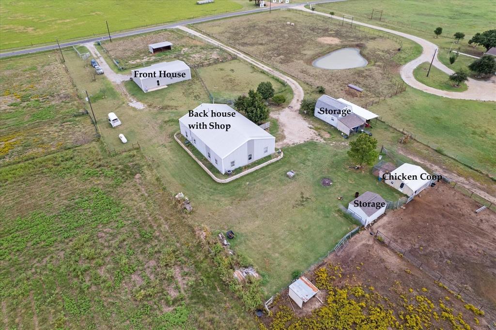 3300 Airport Road Tioga, TX 76271 - Photo 2 of 37 a sign that is sitting in front of a house