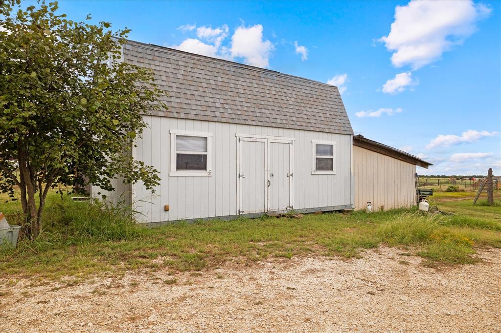 3300 Airport Road Tioga, TX 76271 - Photo 26 of 37 a view of a backyard of the house