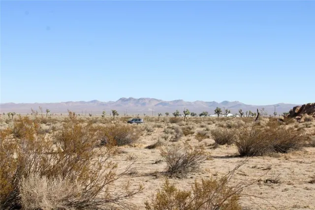 a view of a road with an ocean view