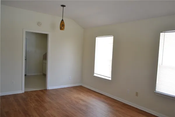 an empty room with windows