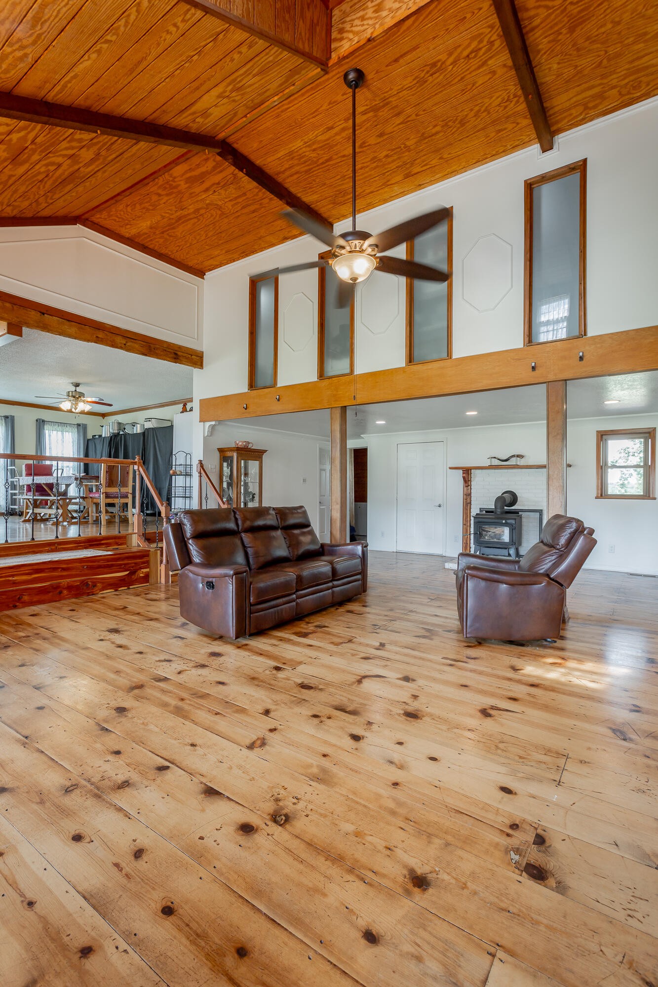 2195 Myers Road Pikeville, TN 37367 - Photo 16 of 100 a view of a patio with table and chairs under an umbrella