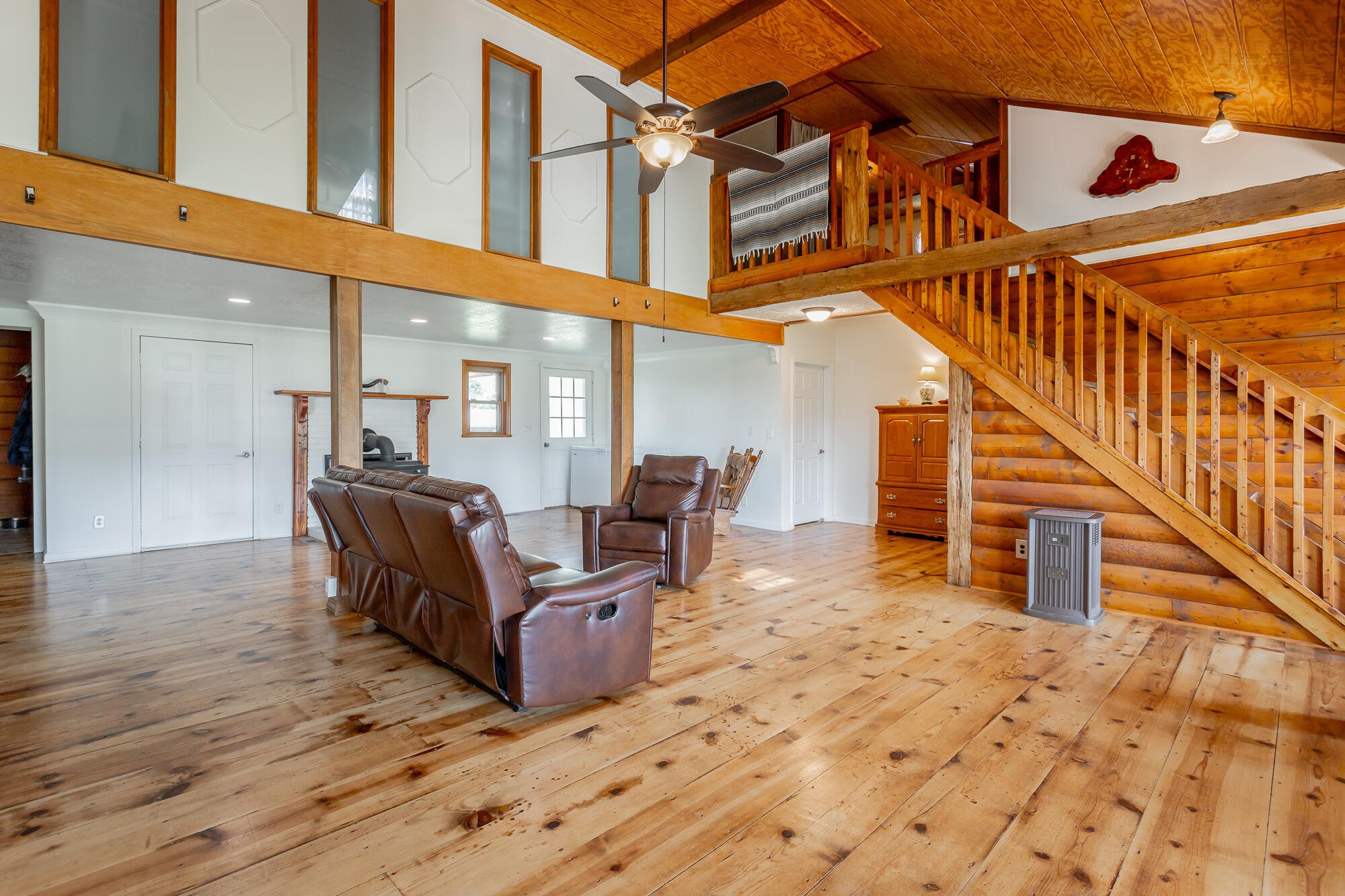 2195 Myers Road Pikeville, TN 37367 - Photo 19 of 100 a view of a couches with wooden floor and in front of building