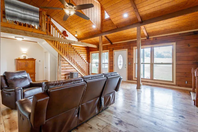a kitchen with stainless steel appliances granite countertop a sink and a stove